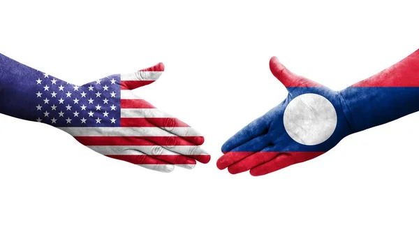手に描かれたラオスとアメリカの旗の間の握手 隔離された透明なイメージ — ストック写真