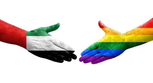 Handslag Mellan Hbt Och Förenade Arabemiratens Flaggor Målade Händer Isolerad — Stockfoto
