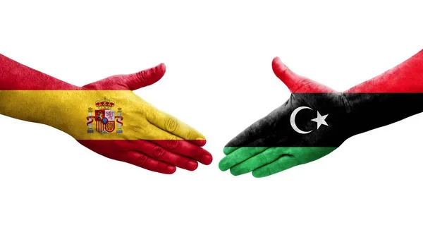 Χειραψία Μεταξύ Λιβύης Και Ισπανίας Σημαίες Ζωγραφισμένες Στα Χέρια Απομονωμένη — Φωτογραφία Αρχείου
