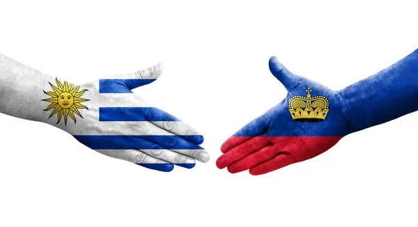 Apretón Manos Entre Las Banderas Liechtenstein Uruguay Pintadas Las Manos — Foto de Stock