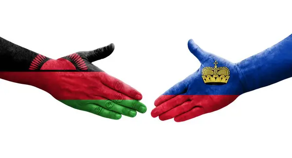 Uścisk Dłoni Między Flagami Liechtensteinu Malawi Namalowanymi Dłoniach Odizolowany Przezroczysty — Zdjęcie stockowe