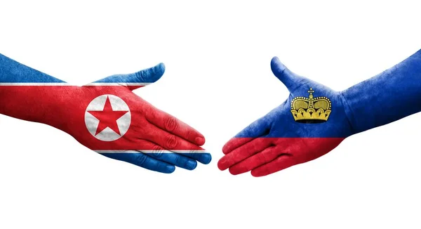 Aperto Mão Entre Liechtenstein Coreia Norte Bandeiras Pintadas Mãos Imagem — Fotografia de Stock