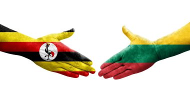 Litvanya ve Uganda bayrakları arasındaki el sıkışma ellerinde izole şeffaf görüntü.