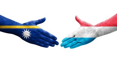 Lüksemburg ve Nauru bayrakları arasında el sıkışma, izole şeffaf görüntü.