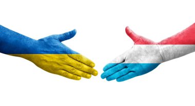 Lüksemburg ve Ukrayna bayrakları arasındaki el sıkışma, izole şeffaf görüntü.