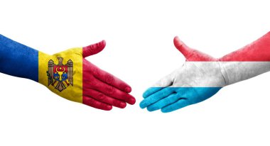 Lüksemburg ve Moldova bayrakları arasındaki el sıkışma, izole şeffaf görüntü.