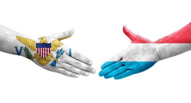 Lüksemburg ve Virgin Adaları arasındaki el sıkışma ellerinde boyanmış bayraklar, izole şeffaf görüntü.