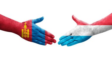 Lüksemburg ve Moğolistan bayrakları arasındaki el sıkışma, izole şeffaf görüntü.