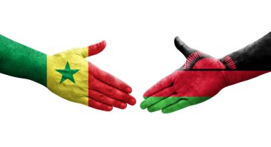 Malawi ve Senegal bayrakları arasındaki el sıkışma, izole şeffaf görüntü.