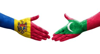 Ellere boyanmış Maldivler ve Moldova bayrakları arasındaki el sıkışma, izole şeffaf görüntü.