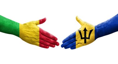 Mali ve Barbados bayrakları arasındaki tokalaşma elleri boyalı, izole şeffaf görüntü.