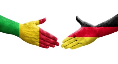 Mali ve Almanya arasındaki el sıkışma ellerinde bayraklar, izole edilmiş şeffaf görüntü.