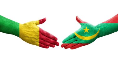 Mali ve Moritanya bayrakları arasındaki tokalaşma elleri boyalı, izole şeffaf görüntü.