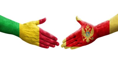 Ellere boyanmış Mali ve Karadağ bayrakları arasındaki el sıkışma, izole edilmiş şeffaf görüntü.