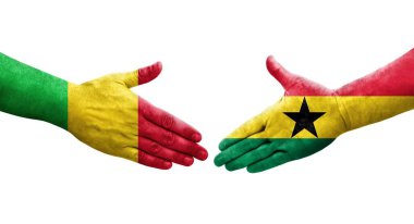 Ellere boyanmış Mali ve Gana bayrakları arasındaki el sıkışma, izole edilmiş şeffaf görüntü.
