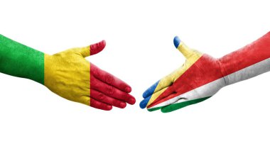 Mali ve Seyşeller arasındaki el sıkışma ellerinde boyanmış bayraklar, yalıtılmış şeffaf görüntü.