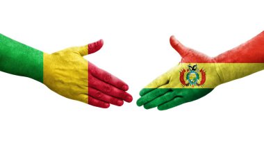 Mali ve Bolivya bayrakları arasındaki tokalaşma elleri boyalı, izole şeffaf görüntü.