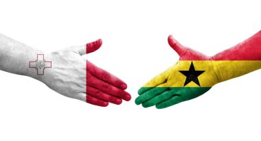 Malta ve Gana bayrakları arasındaki el sıkışma ellere boyanmış, izole şeffaf görüntü.