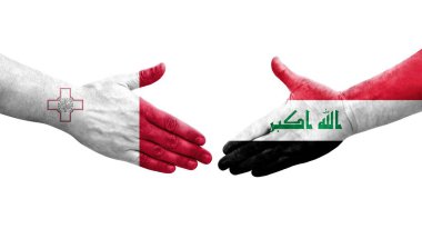Malta ve Irak bayrakları arasında el sıkışma, izole şeffaf görüntü.