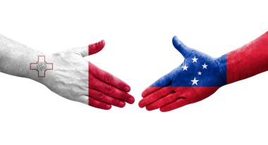 Ellere boyanmış Malta ve Samoa bayrakları arasındaki el sıkışma, izole şeffaf görüntü.