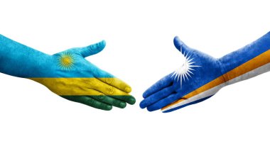 Marshall Adaları ve Ruanda bayrakları arasındaki el sıkışma ellerinde izole şeffaf görüntü.