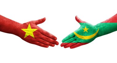 Moritanya ve Vietnam bayrakları arasındaki el sıkışma ellerinde resmedilmiş şeffaf görüntü.
