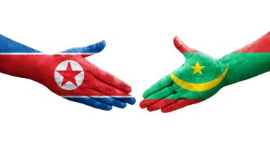 Moritanya ve Kuzey Kore bayrakları arasındaki el sıkışma ellerinde resmedilmiş şeffaf görüntü.