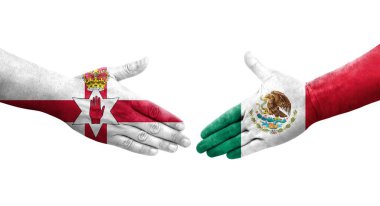 Meksika ve Kuzey İrlanda bayrakları arasında el sıkışma, izole şeffaf görüntü.