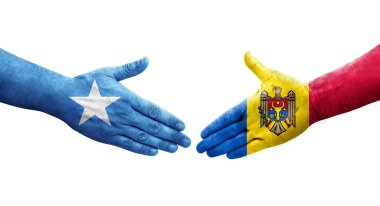 Moldova ve Somali bayrakları arasındaki el sıkışma ellerinde resmedilmiş şeffaf görüntü.