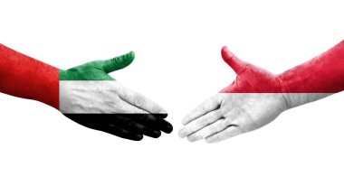 Monako ve BAE bayrakları arasında el sıkışma, izole saydam görüntü.