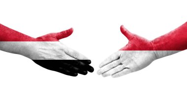 Ellerinde Monako ve Yemen bayrakları arasında el sıkışma, izole şeffaf görüntü.