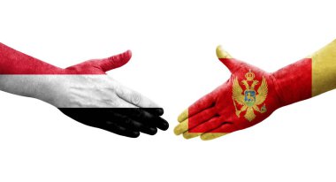 Karadağ ile Yemen bayrakları arasındaki el sıkışma, izole şeffaf görüntü.