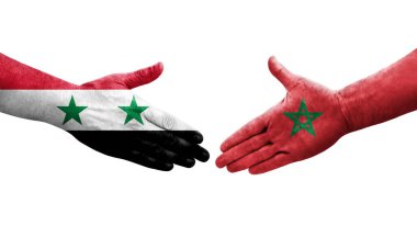 Fas ve Suriye bayrakları arasında el sıkışma, izole şeffaf görüntü.