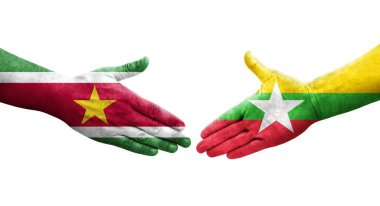 Myanmar ve Surinam bayrakları arasındaki el sıkışma, izole şeffaf görüntü.