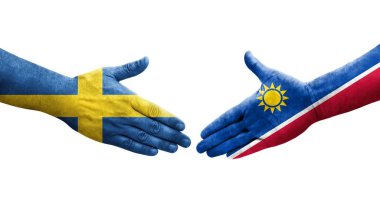 Ellerinde Namibya ve İsveç bayrakları arasında el sıkışma, izole şeffaf görüntü.