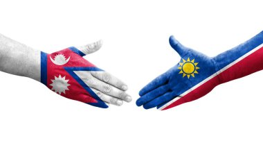 Ellerinde Namibya ve Nepal bayrakları arasında el sıkışma, izole şeffaf görüntü.