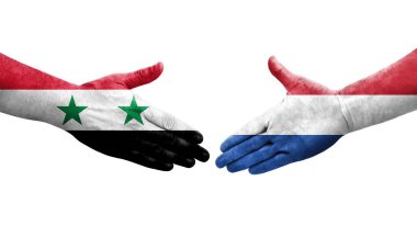 Hollanda ile Suriye bayrakları arasındaki el sıkışma, izole edilmiş şeffaf görüntü.