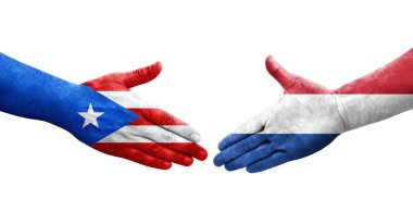 Hollanda ve Porto Riko bayrakları arasındaki el sıkışma ellerinde izole şeffaf görüntü.