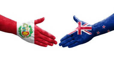 Yeni Zelanda ve Peru bayrakları arasında el sıkışma ellere boyanmış, izole şeffaf görüntü.