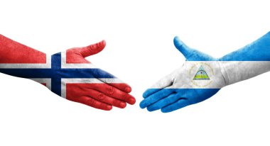 Ellerinde Nikaragua ve Norveç bayrakları arasında el sıkışma, izole şeffaf görüntü.