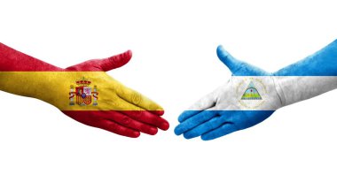 Nikaragua ve İspanya bayrakları arasında el sıkışma, izole şeffaf görüntü.