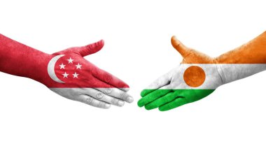 Ellerinde Nijer ve Singapur bayrakları arasında el sıkışma, izole şeffaf görüntü.