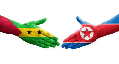 Kuzey Kore ve Sao Tome ve Principe bayrakları arasındaki el sıkışma..