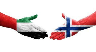 Norveç ve BAE bayrakları arasında el sıkışma, izole edilmiş şeffaf görüntü.