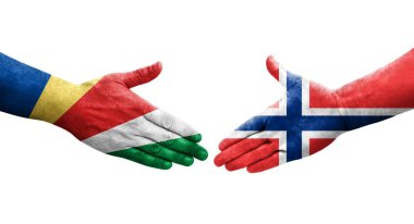 Norveç ve Seyşeller arasındaki el sıkışma ellerinde boyanmış bayraklar, izole şeffaf görüntü.