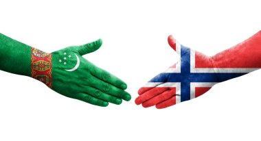 Ellerinde Norveç ve Türkmenistan bayrakları arasında el sıkışma, izole şeffaf görüntü.