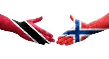 Norveç ve Trinidad Tobago bayrakları arasındaki el sıkışma ellerinde izole şeffaf görüntü.