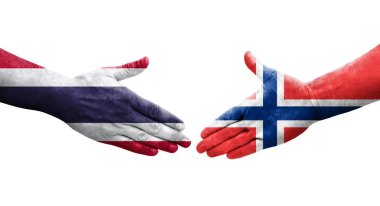 Ellerinde Norveç ve Tayland bayrakları arasında el sıkışma, izole şeffaf görüntü.