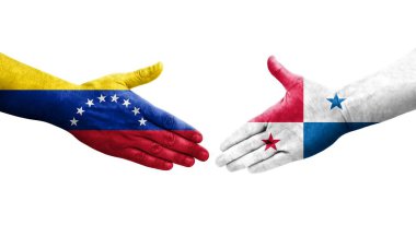 Panama ve Venezuela bayrakları arasındaki tokalaşma elleri boyalı, izole şeffaf görüntü.