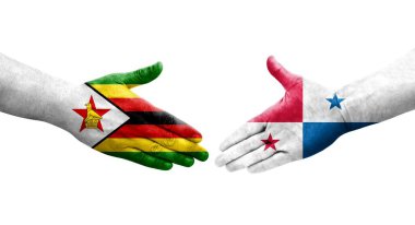 Panama ve Zimbabwe bayrakları arasındaki tokalaşma elleri boyalı, izole şeffaf görüntü.